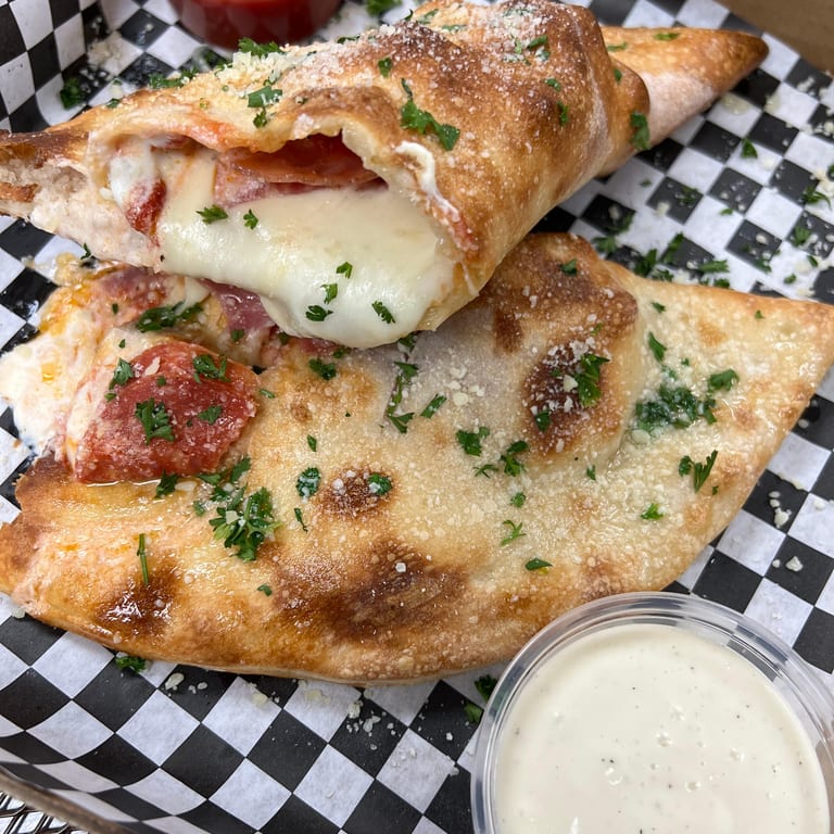 Savor Our Calzone Today